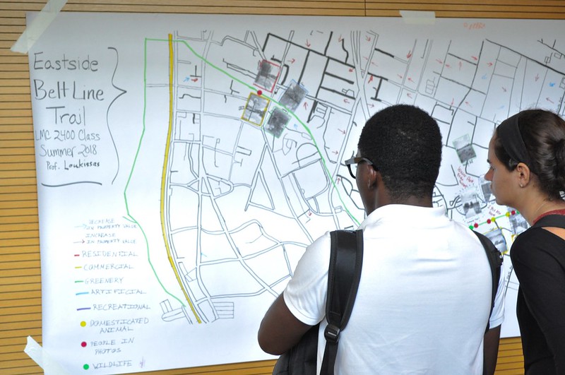 students look at a map